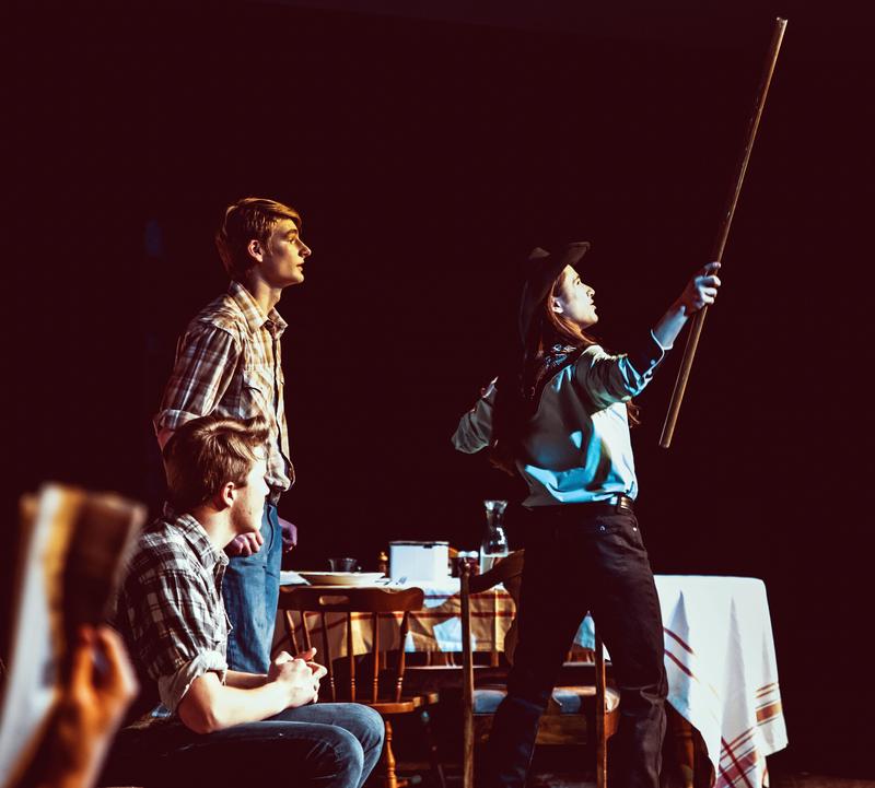 NHS students, two male, one female, perform a scene from \"The Rainmaker.\"