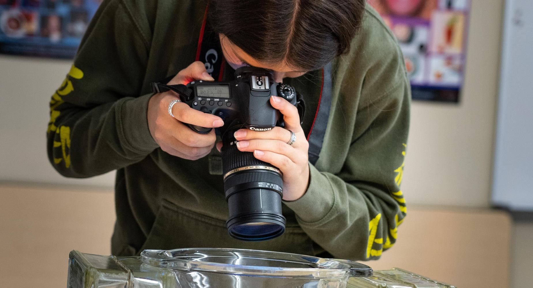 Student in Photo class