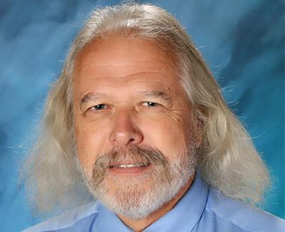 Dr. Paul Harman, Centennial Principal