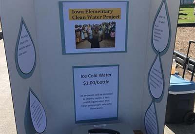 A board outlines the students\' water project.