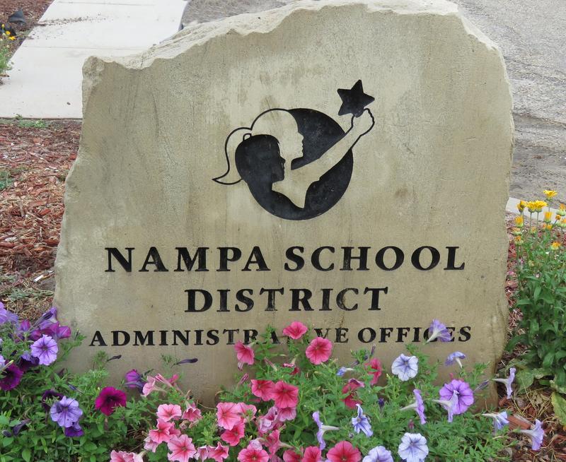 Rock with NSD logo carved on it