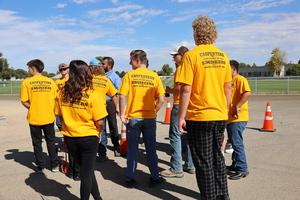 Backs of student t-shirts reading Carpenters were created because engineers need heroes too.