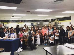 Group photo of YEAH participants and Skyview junior chefs.
