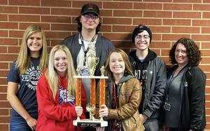 Jasmine Augustine, Kassidee Clayton, Ty Davis, Artemis Jensen and Abigail McClinn pose with their advisor and trophy.