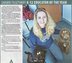 Photo of Shawn Tegethoff and therapy dogs from Idaho Press article.