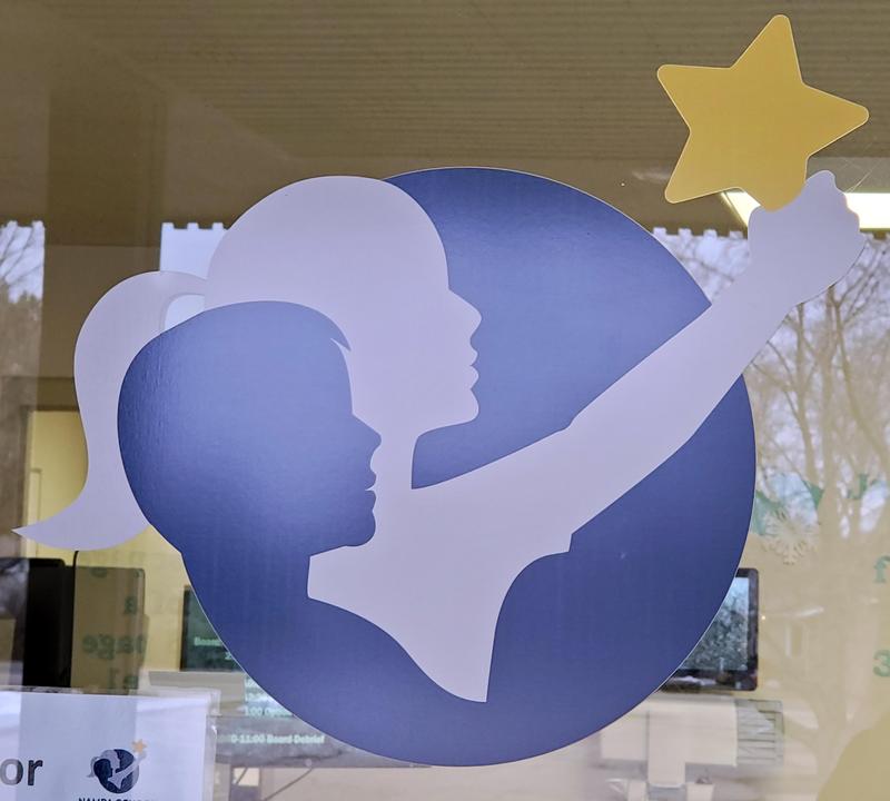 NSD logo decal - two children in profile, one holding a star aloft.