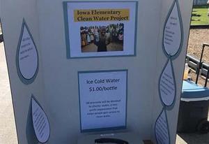 A board outlines the students\' water project.