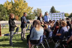 The mayor and district officials chat with kids