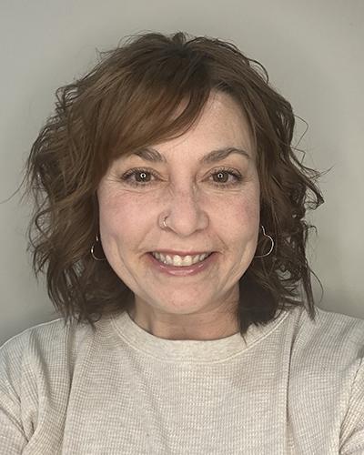 Headshot of Sarah Wang.