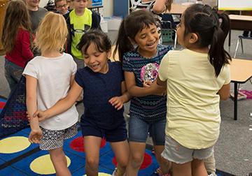 Children play during an educational game at Greenhurst Elementary
