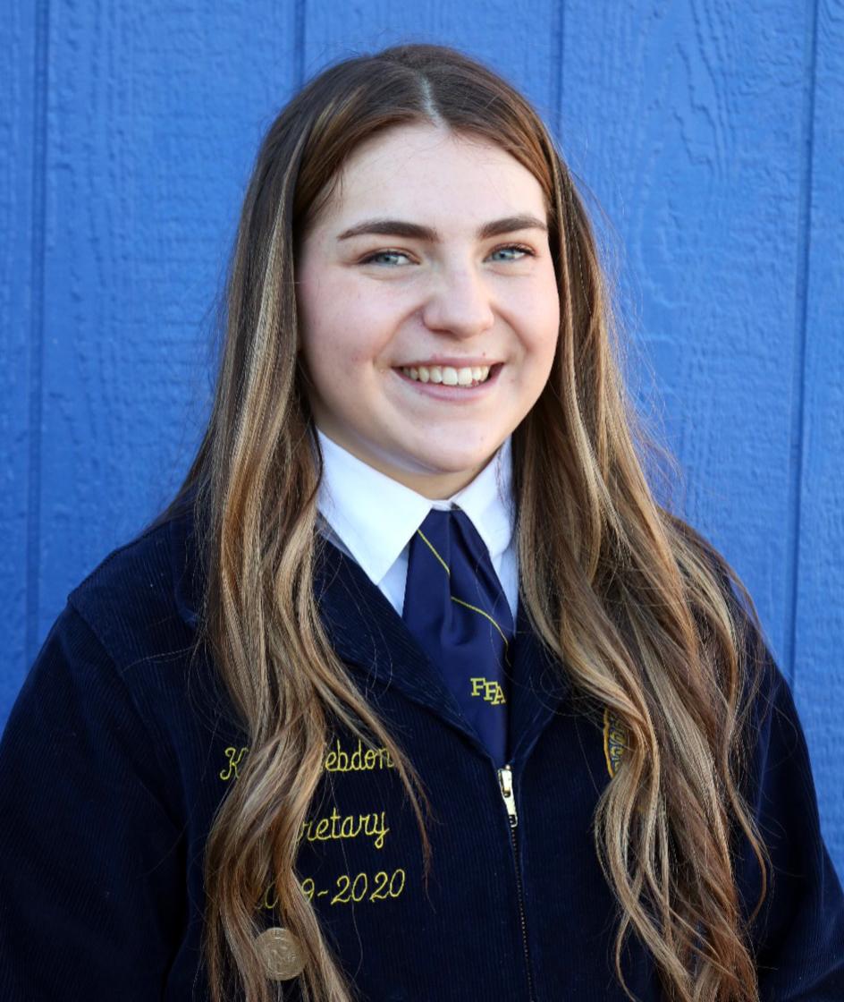 Headshot of Katie Hebdon in her blue FFA jacket