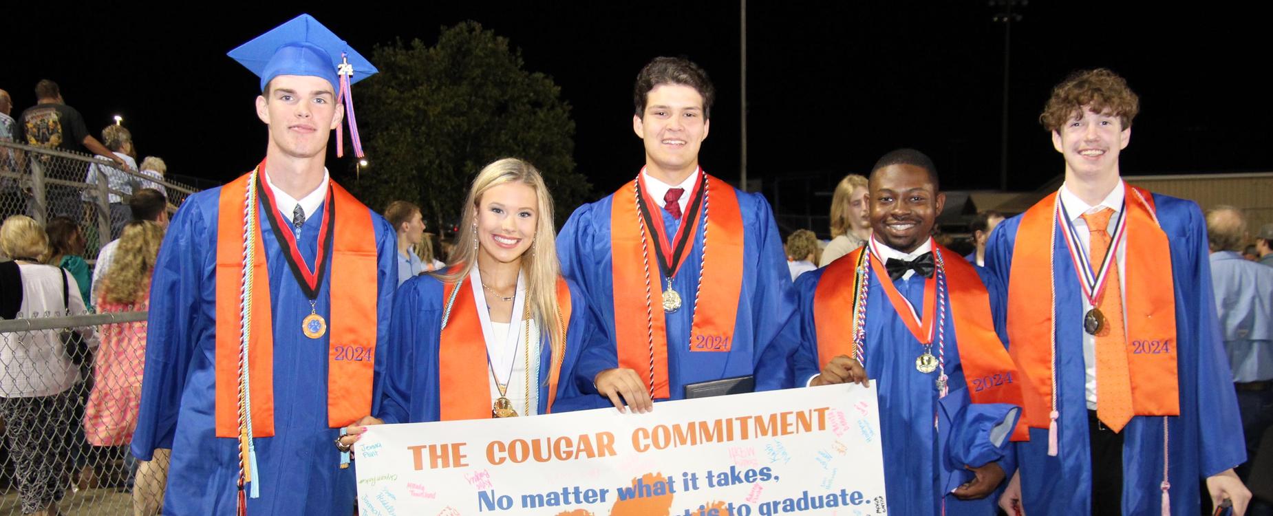 Graduates with Commit Banner