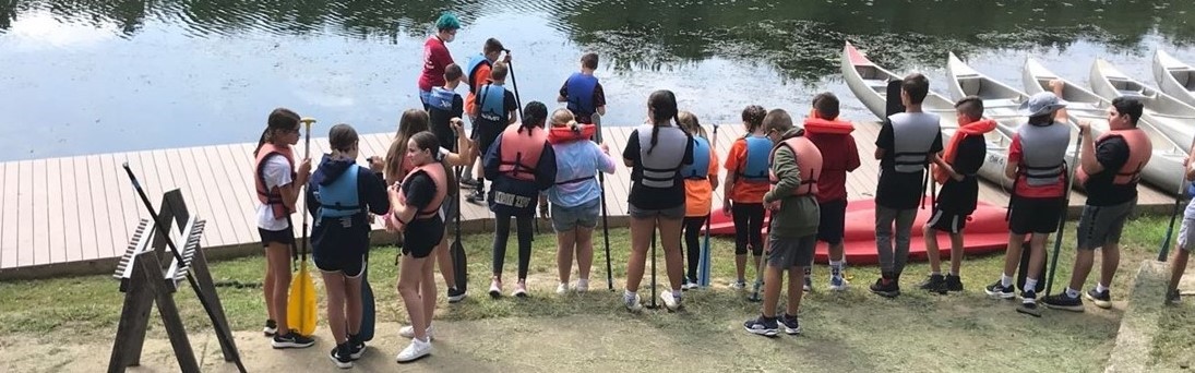 students waiting to to canoeing