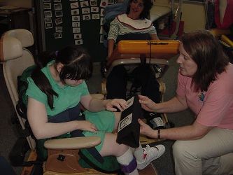 Teacher working with Student