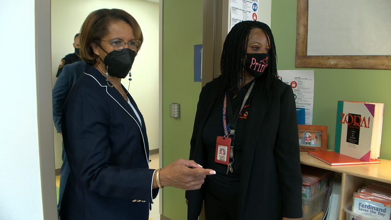 Dr. Jenkins and Principal Harris visit a classroom