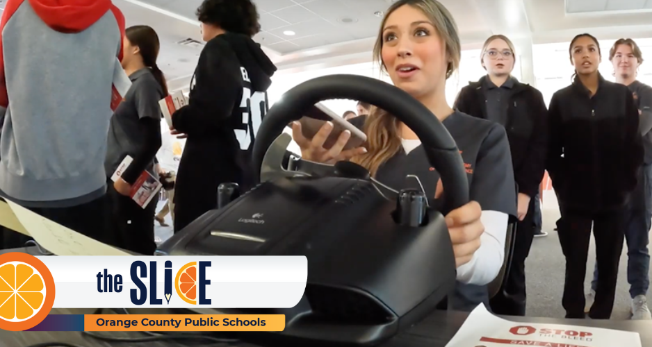 A female student texts while driving simulated car