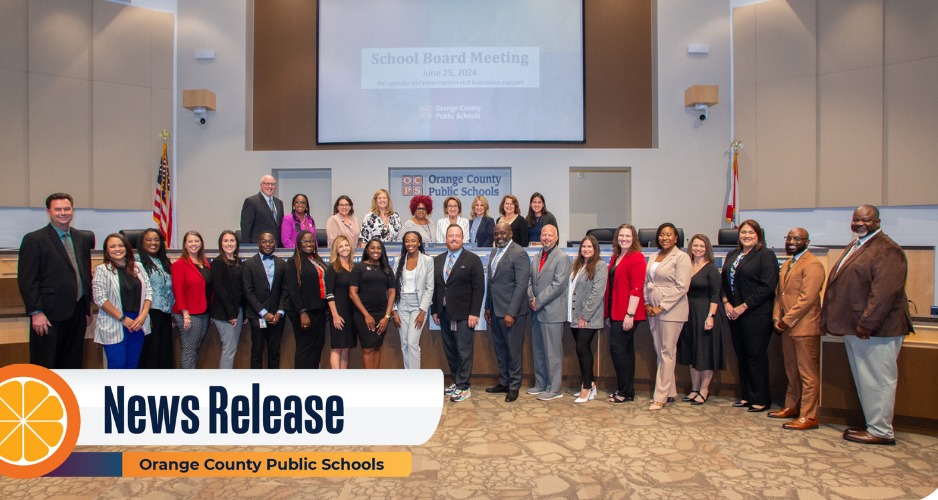 Large group of new administrators in front of the dais