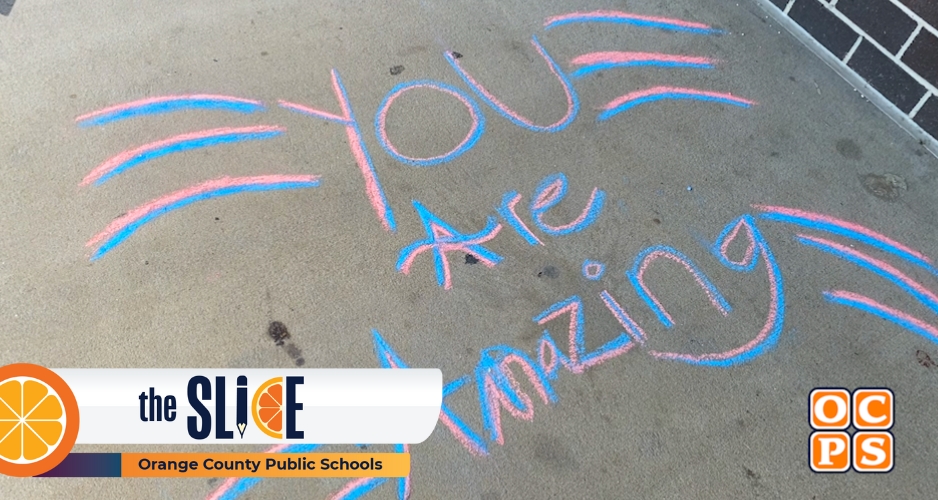 Gotha Middle School students create positive chalk art messages throughout the campus