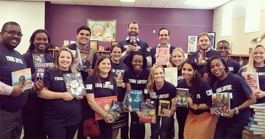 Group of Young Lawyers show off books donated to book drive