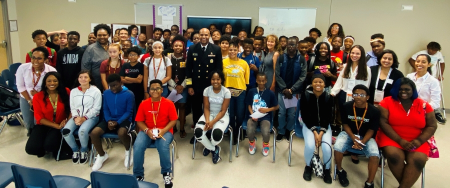 Surgeon General surrounded by students