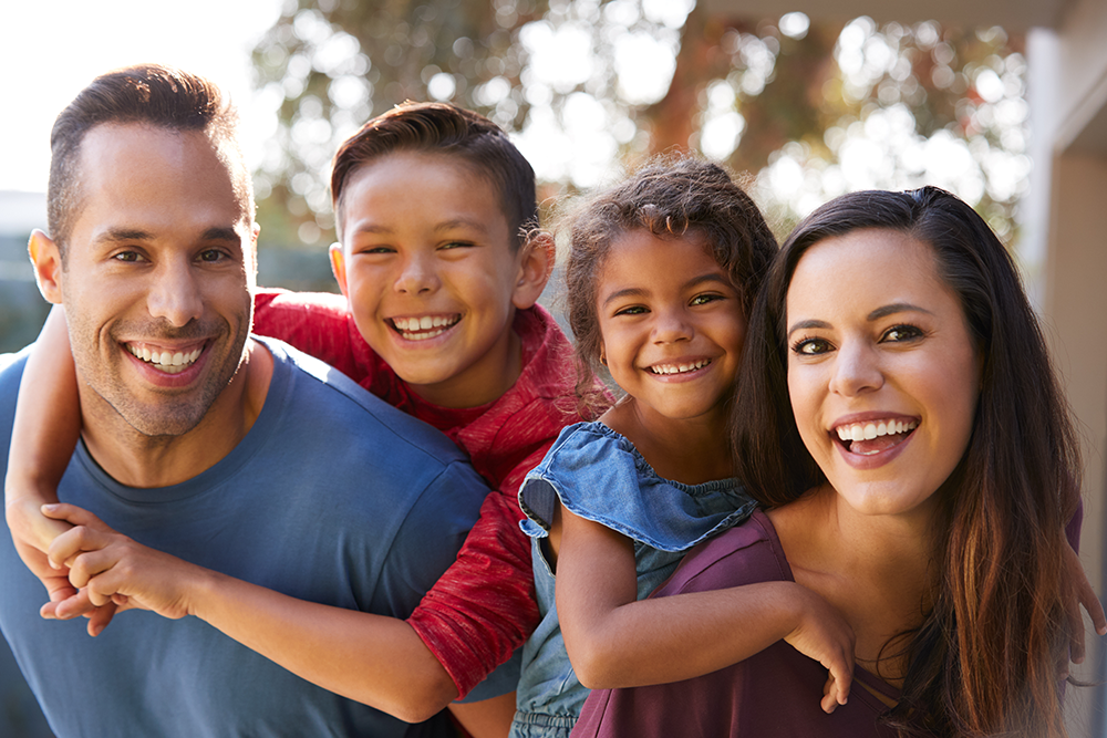 Latino Family embracing each other