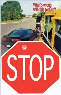 What's wrong with this picture?  Red Stop sign indicating the black car should not attempt to pass the school bus.