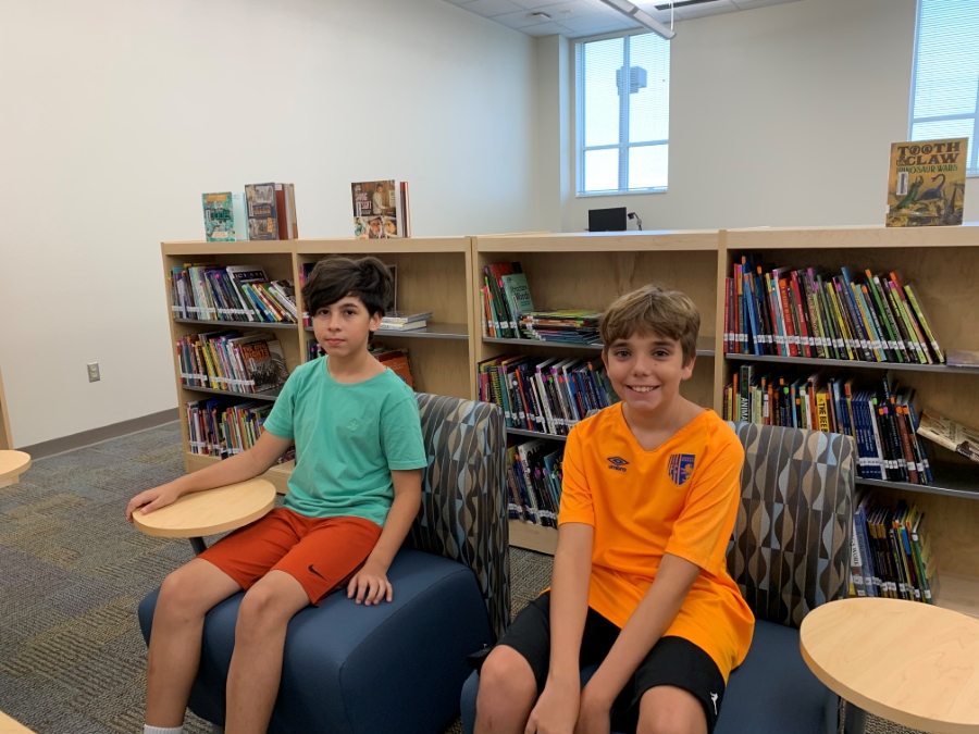 Two boys in library