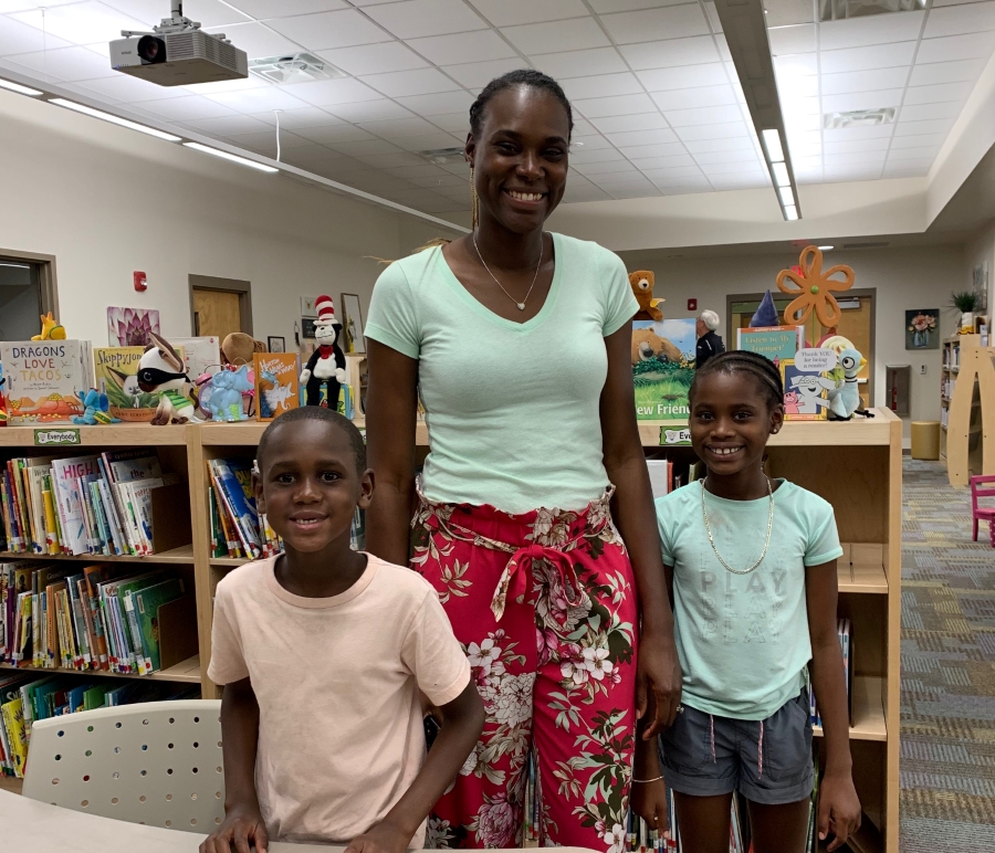 Family waits in library