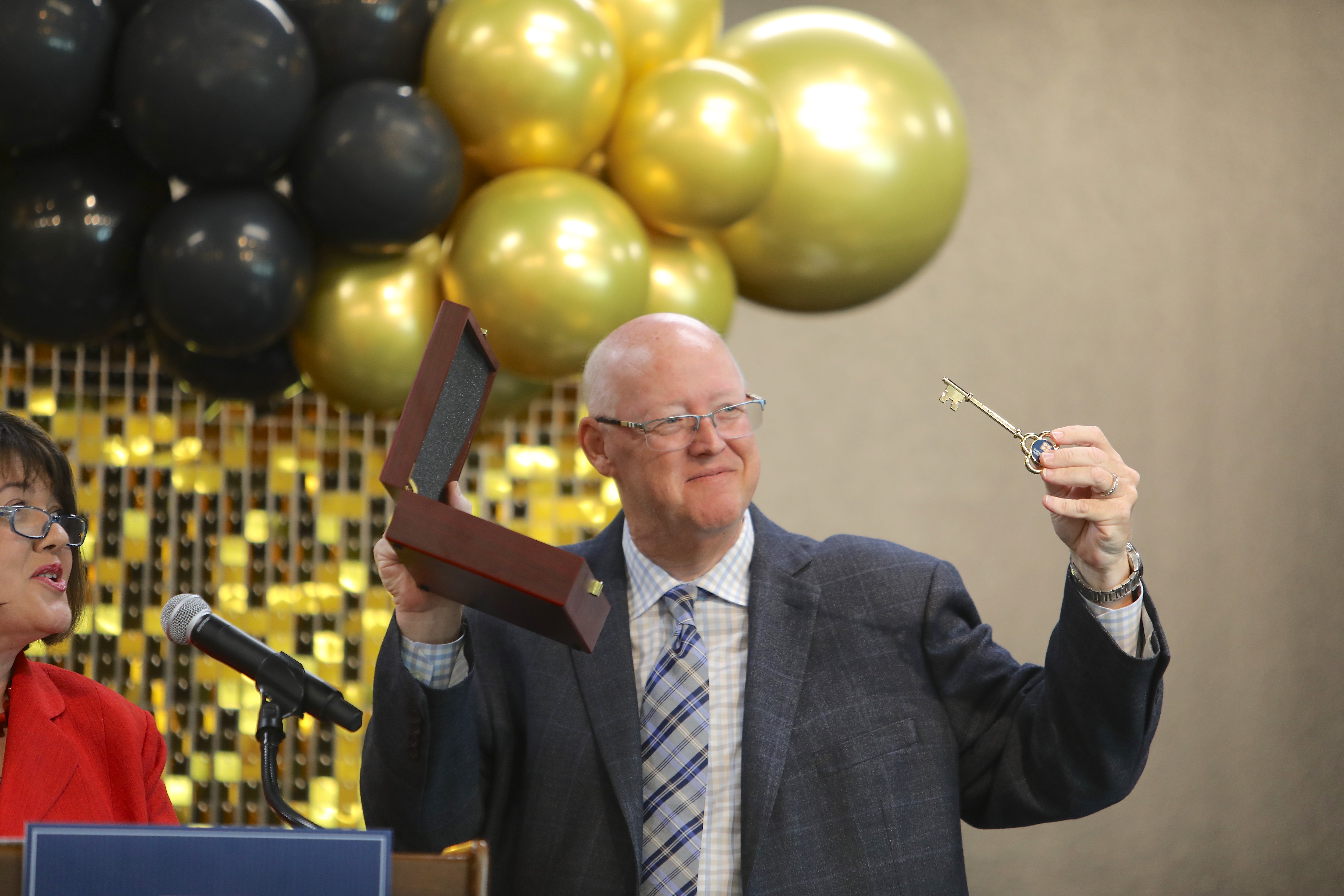 Stonewyck ES principal holds key to the school during dedication ceremony