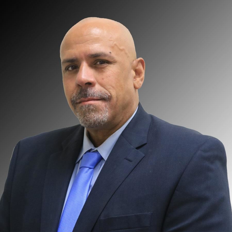 Woman Smiling Sitting at Desk