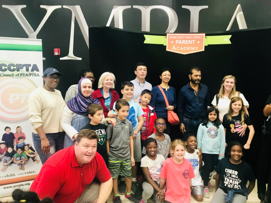 Group of TES students and parents at Parent Academy event 