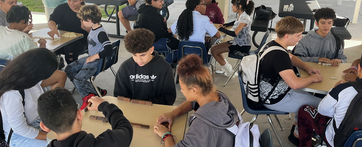 Students competing in dominoes competition