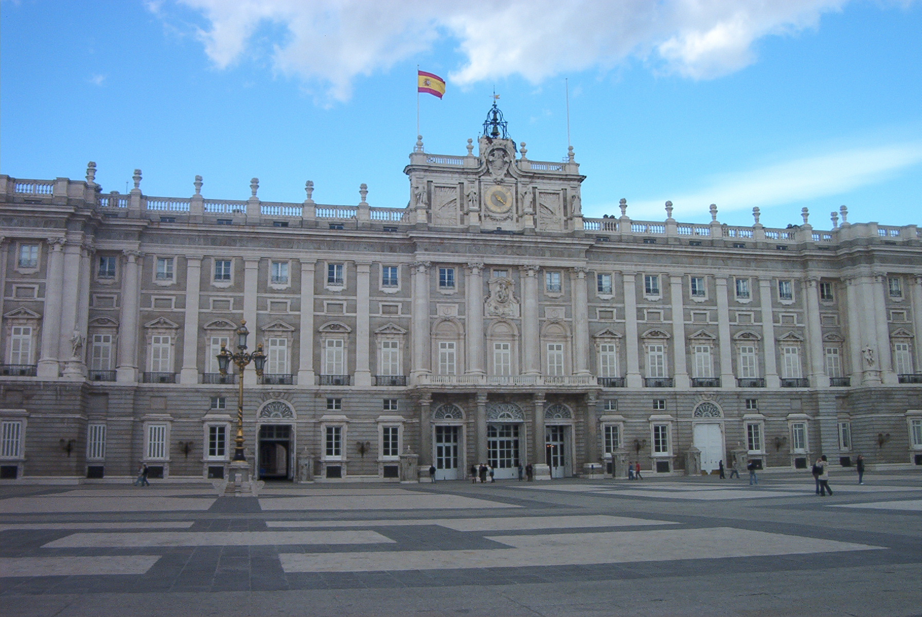 Picture of a building in Spain with a Spanish flag Picture of a building in Spain with a Spanish flag