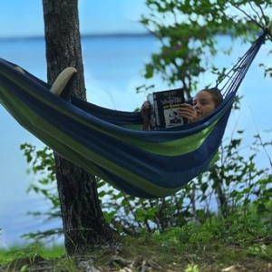 Girl In Hammock reading book