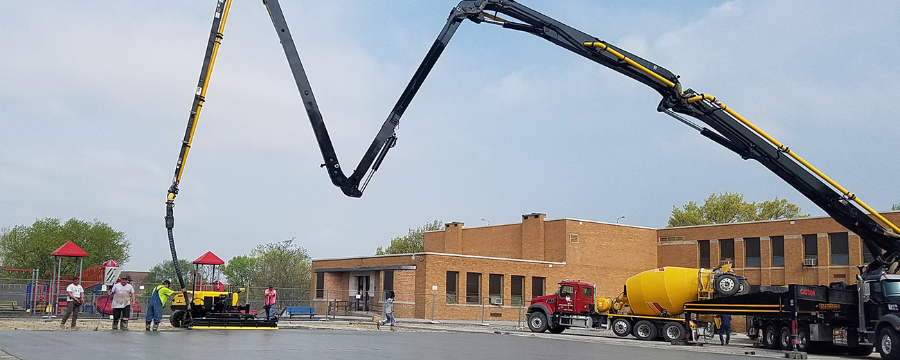 Pouring the concrete base for Wilson's new Mini-Pitch system.