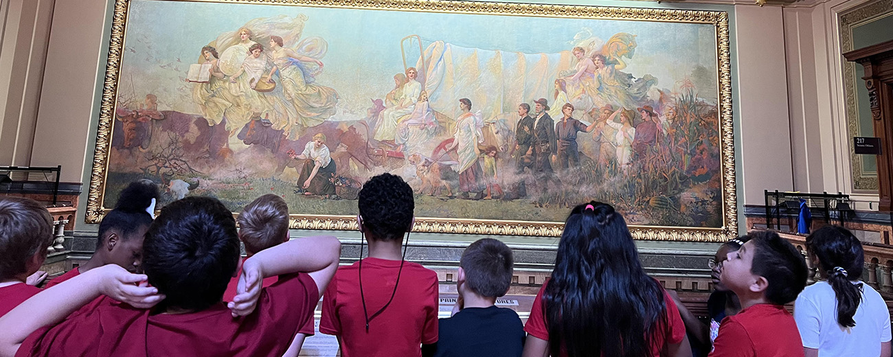 Students enjoy artwork at the Iowa capitol building.