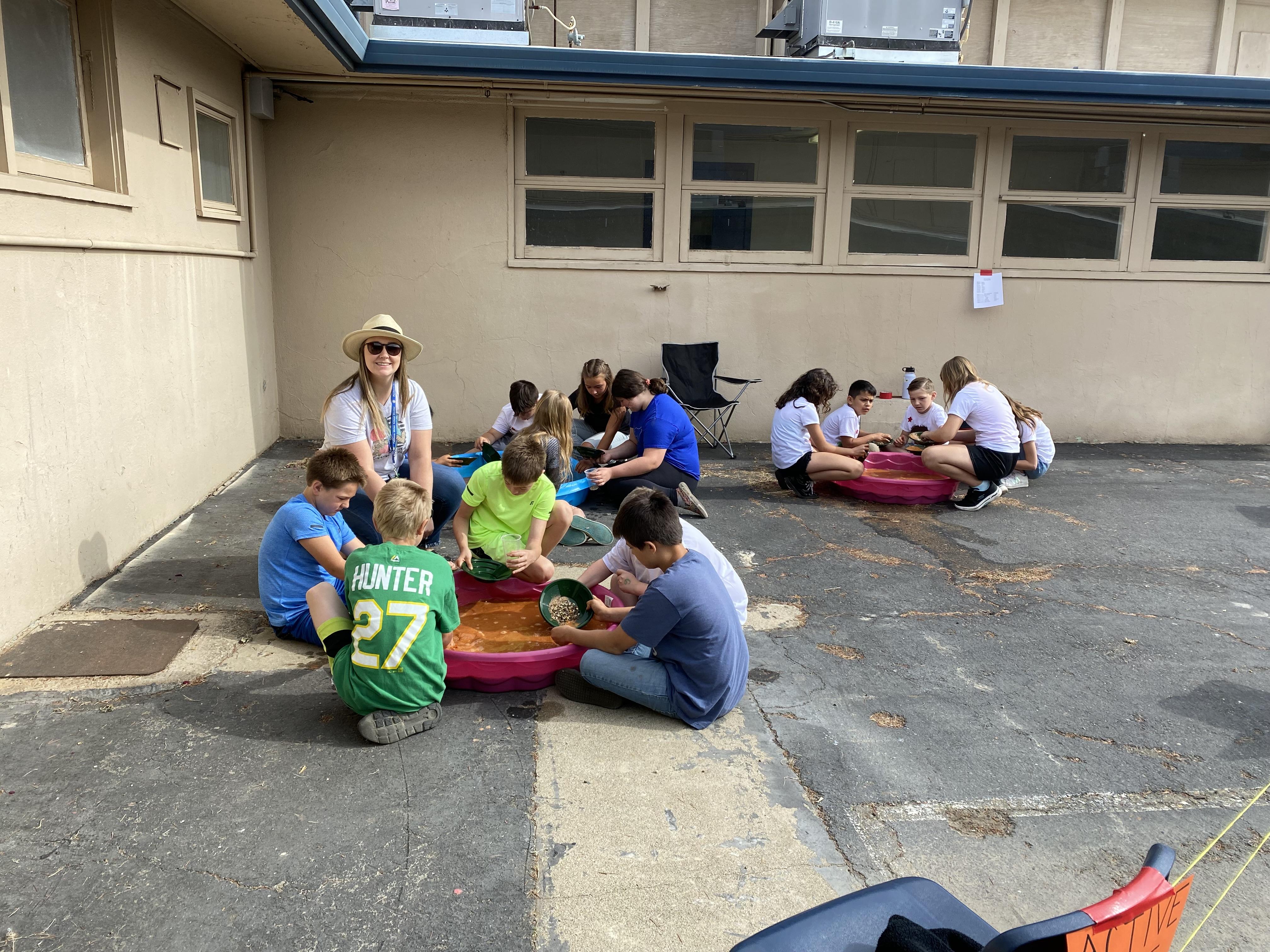 Mrs. Johnson's class panning for gold at Pacheco School