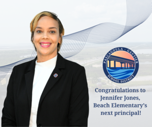 Jennifer Jones smiles in front of drone photo over Pascagoula River