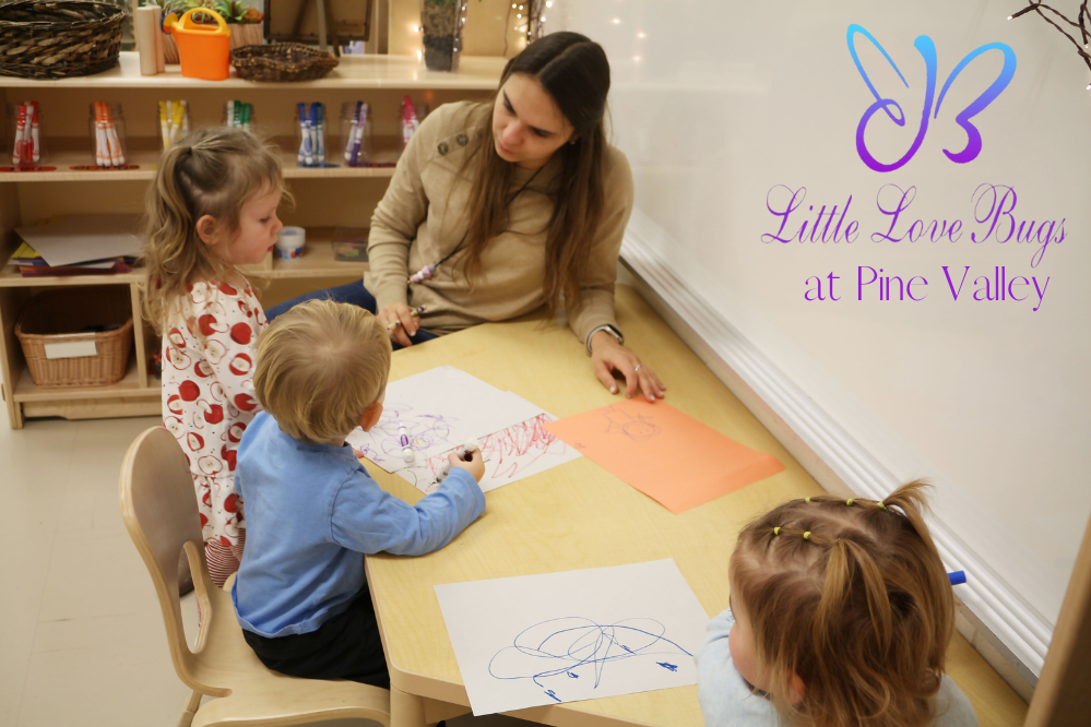 Monica Kenny helps children with art. 