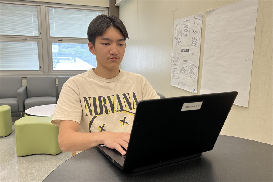 student at laptop