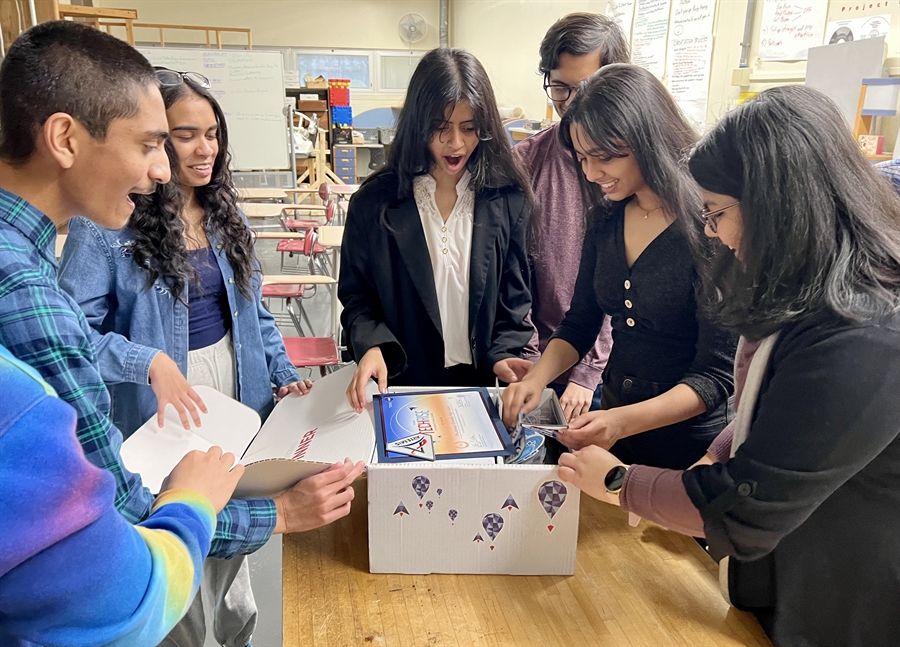 PHS engineers opening equipment box