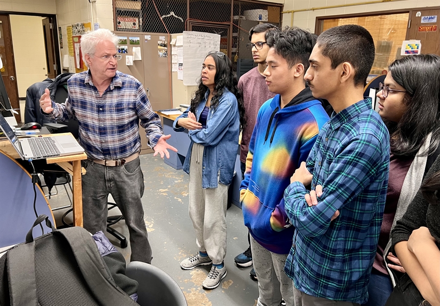 teacher talking to students