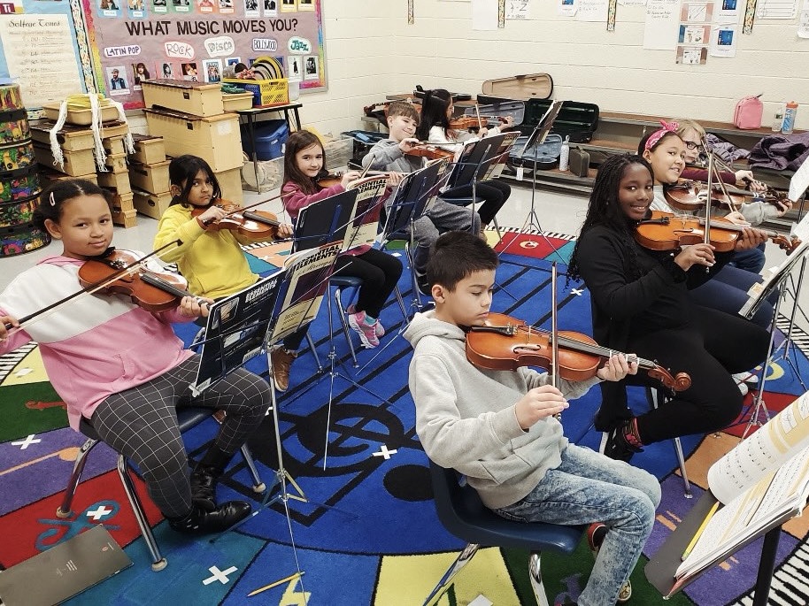 students with violins