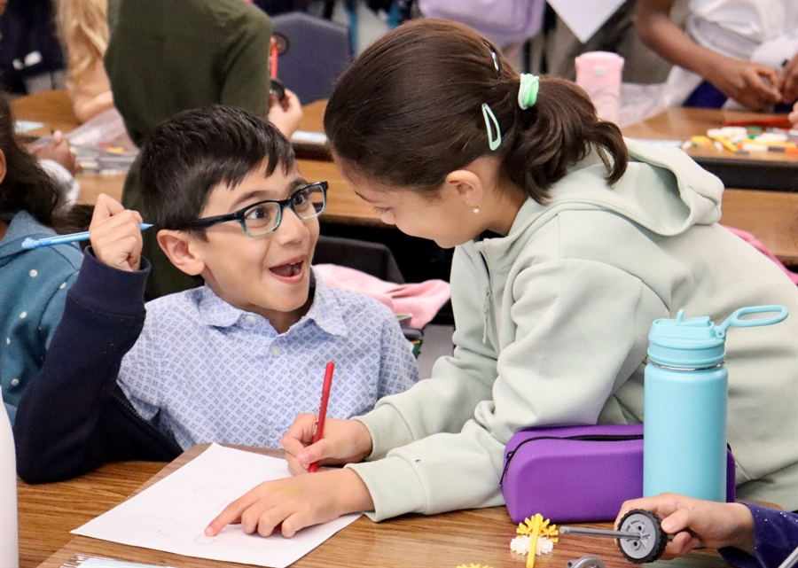 two students working in class