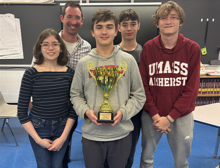 : The Earl L. Vandermeulen High School JV Academic Team.