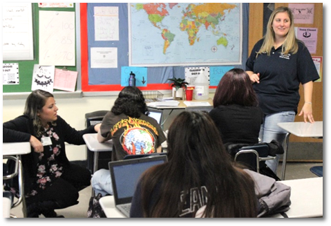 Ethan Allen Staffing&rsquo;s Amy Van Tassel, far left, and PHS&rsquo; Kelly Semexant, far right, speak with students about designing their resumes.