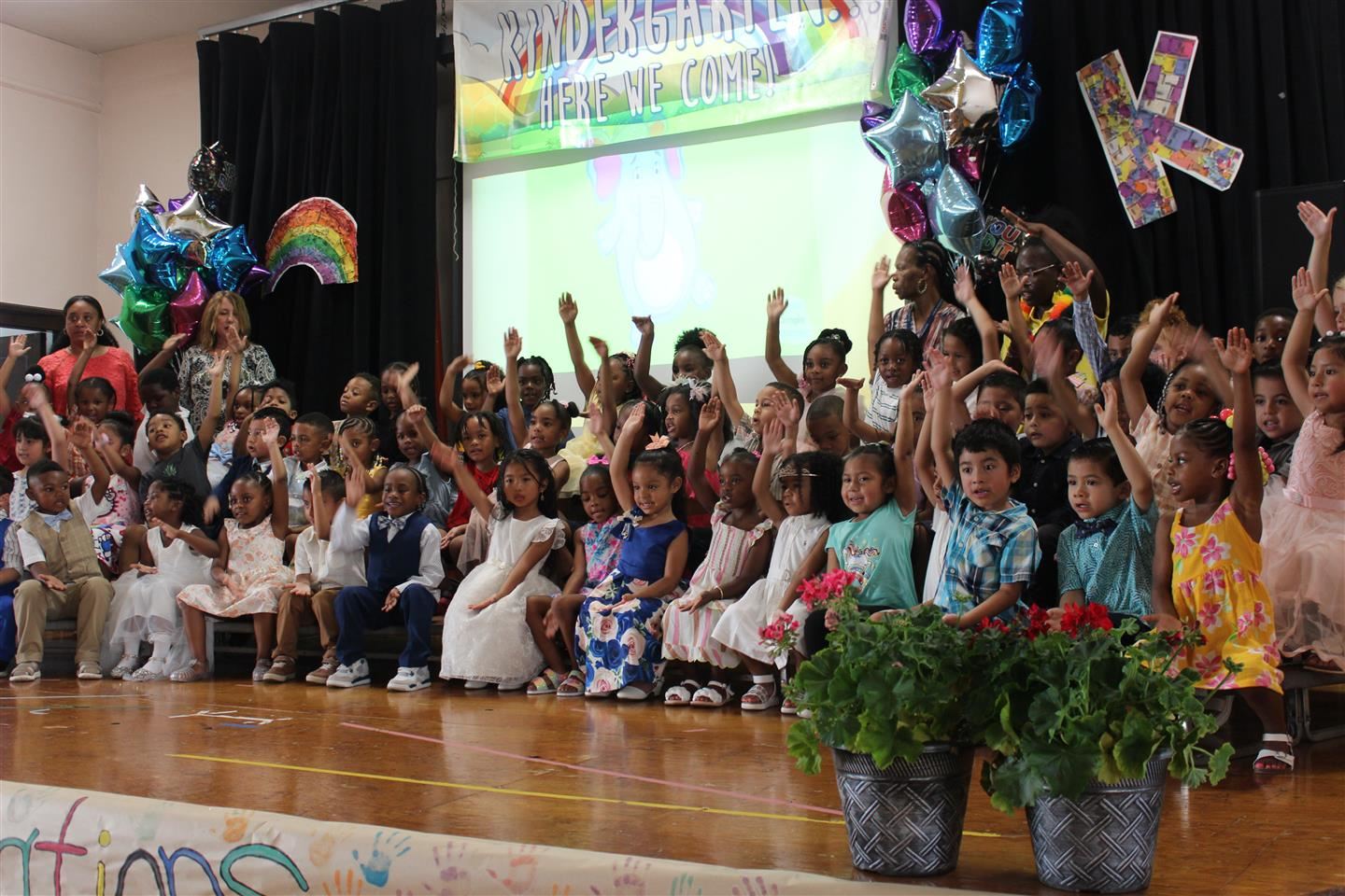  Early Learning Center pre-K students perform at a moving up ceremony