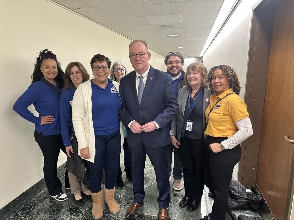  Members of the Community Schools Department met with state lawmakers like Sen. Rob Rolison, center.