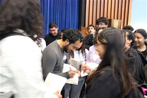 Author Javier Zamora signs copies of his book for ENL students at PHS.