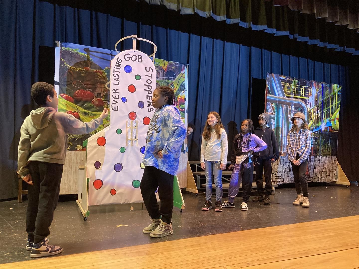 Six students perform in a play rehearsal